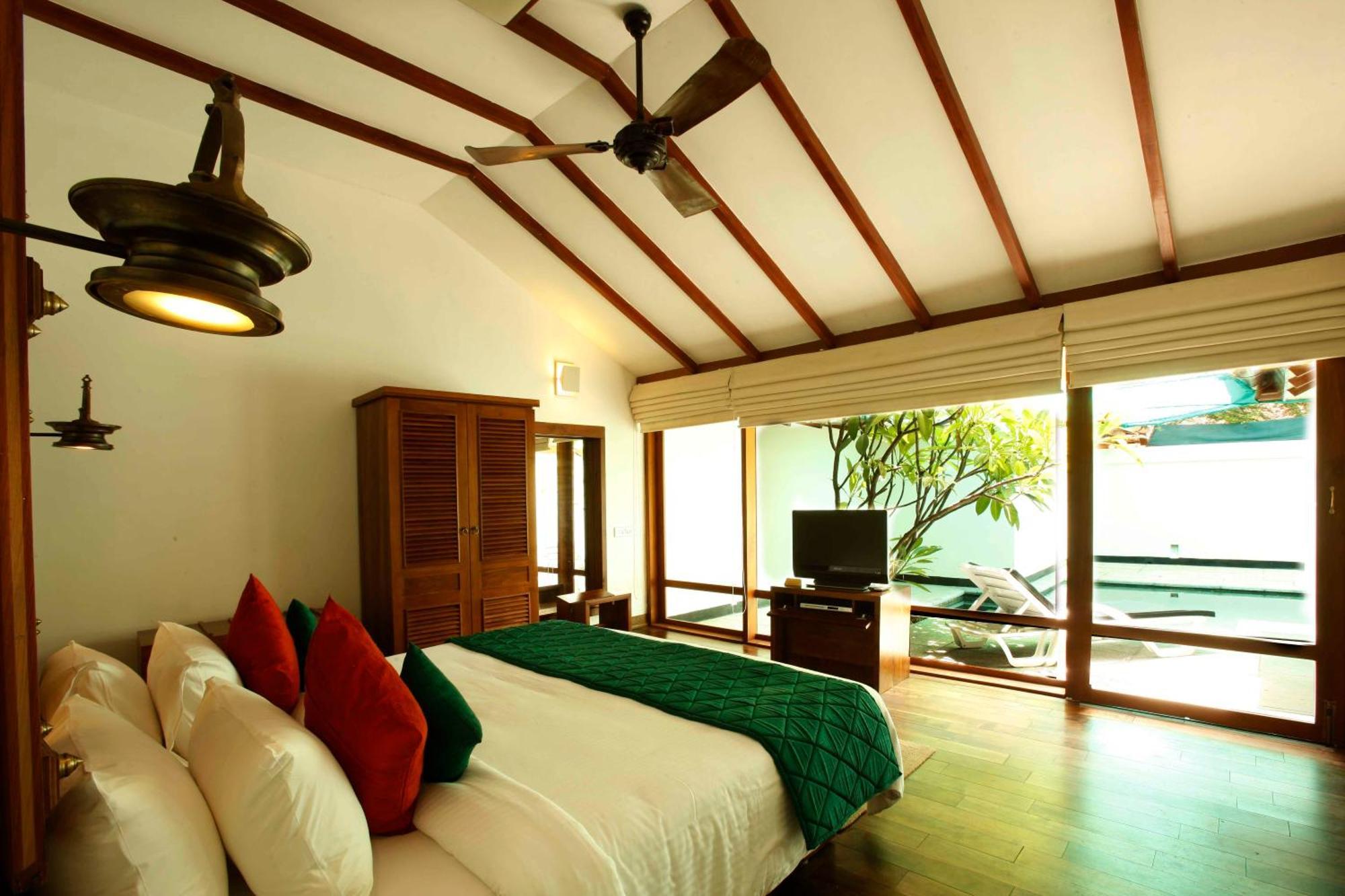 Heritage Madurai Δωμάτιο φωτογραφία A bedroom at the resort