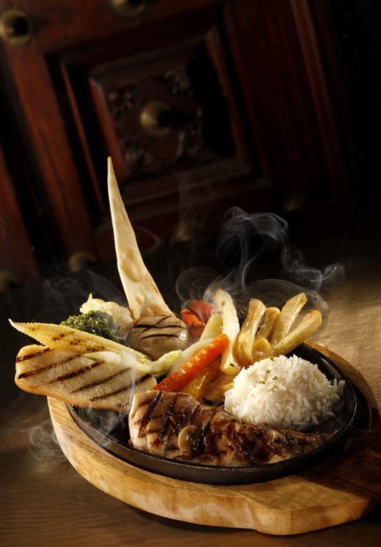 Heritage Madurai Εξωτερικό φωτογραφία A dish from the restaurant