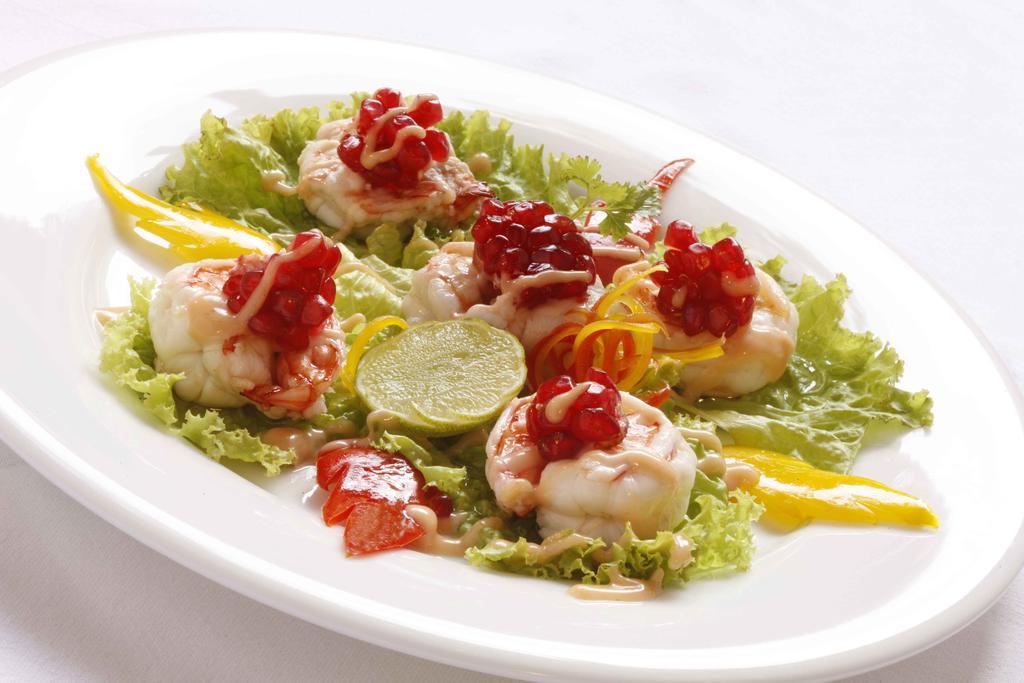 Heritage Madurai Εξωτερικό φωτογραφία A salad of scallops