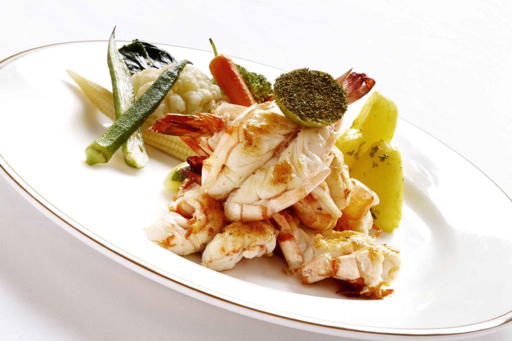 Heritage Madurai Εξωτερικό φωτογραφία A prepared crab