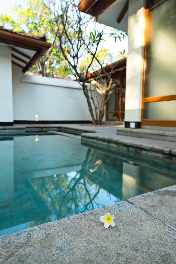 Heritage Madurai Εξωτερικό φωτογραφία A swimming pool at a private residence in Bangalore, India